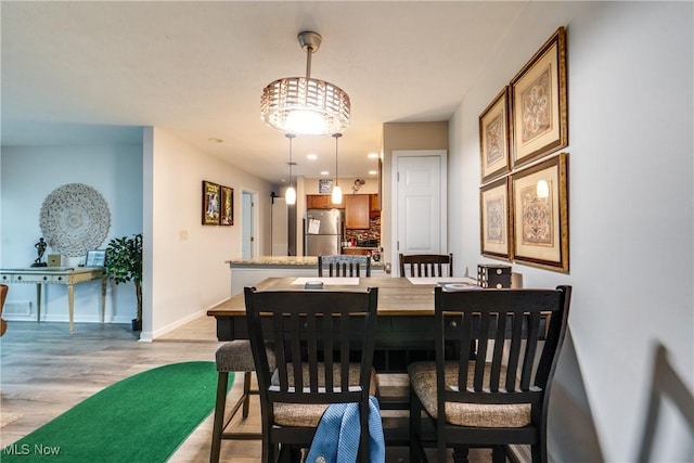 985 Canyon View Rd Unit 204C, Northfield, OH 44067 - dining room featuring light wood-style flooring and recessed lighting