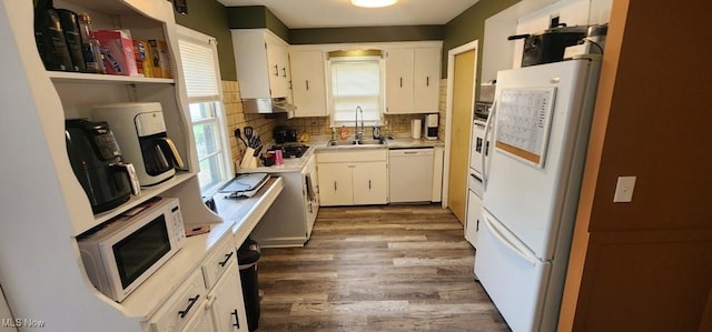 963 Chelston Rd, South Euclid, OH 44121 - kitchen featuring white appliances, wood finished floors, light countertops, white cabinetry, and backsplash
