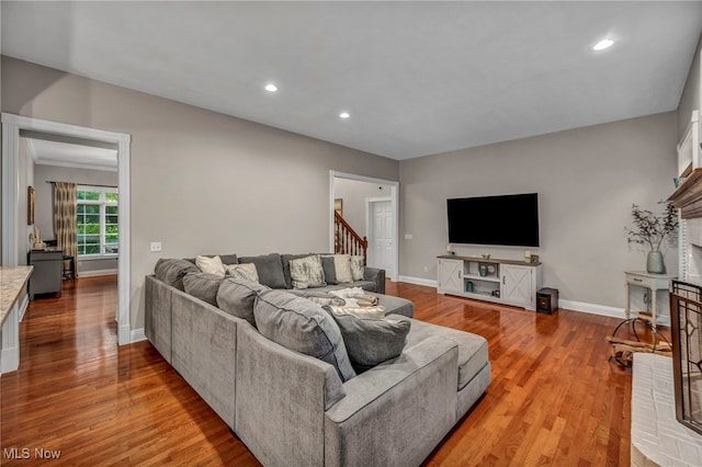 7955 Forest Valley Ln, Concord, OH 44077 - living area with light wood finished floors, recessed lighting, and stairs
