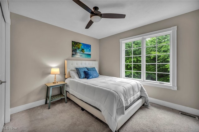 7955 Forest Valley Ln, Concord, OH 44077 - carpeted bedroom with baseboards and a ceiling fan