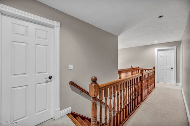 7955 Forest Valley Ln, Concord, OH 44077 - corridor featuring an upstairs landing and carpet flooring