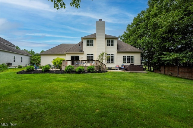 7955 Forest Valley Ln, Concord, OH 44077 - rear view of property featuring a hot tub, a chimney, a deck, and a patio