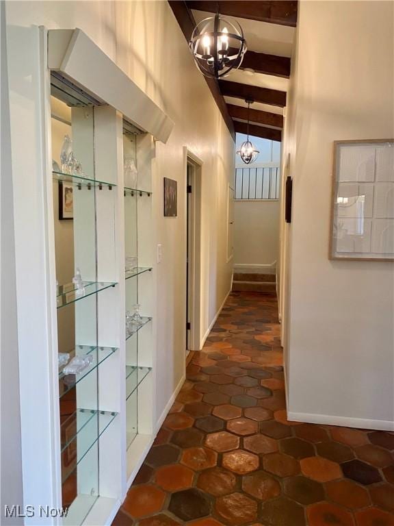 17079 Cats Den Rd, Chagrin Falls, OH 44023 - hallway with beam ceiling and a chandelier