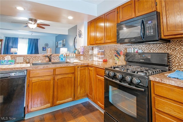 2262 Pine Top Ct Unit 31, Akron, OH 44319 - kitchen with black appliances, a ceiling fan, light countertops, and decorative backsplash