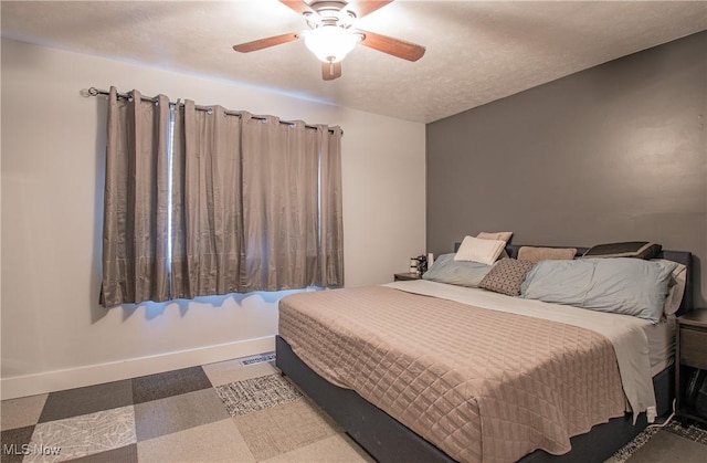 2262 Pine Top Ct Unit 31, Akron, OH 44319 - bedroom featuring baseboards and ceiling fan