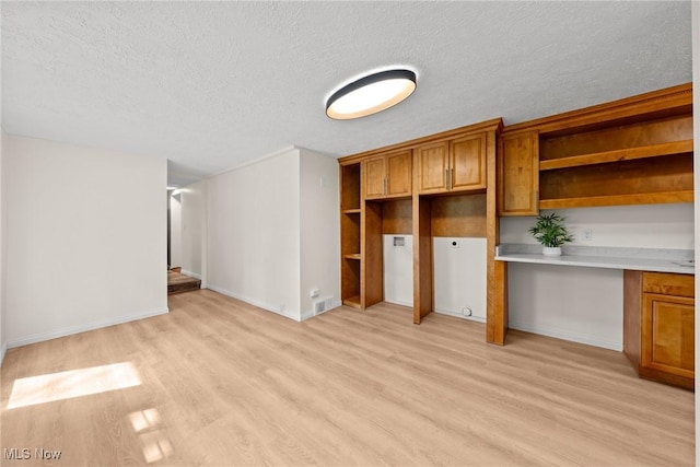3695 S Hametown Rd, Norton, OH 44203 - unfurnished office featuring light wood-type flooring and a textured ceiling