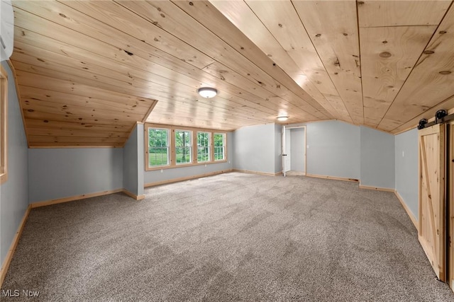 3695 S Hametown Rd, Norton, OH 44203 - bonus room featuring wood ceiling, vaulted ceiling, carpet floors, and a barn door