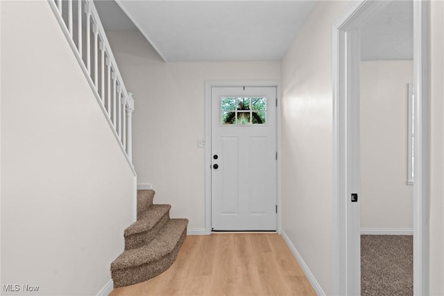 3695 S Hametown Rd, Norton, OH 44203 - foyer with stairway and light wood-style flooring