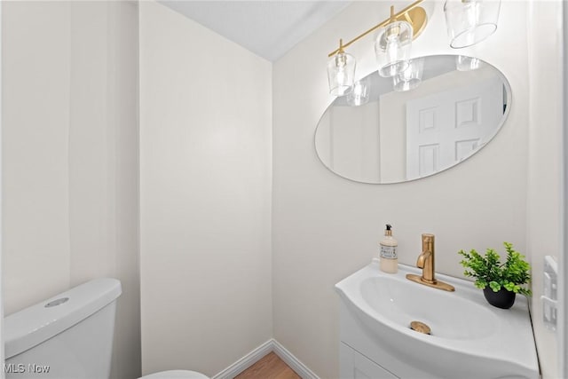 3695 S Hametown Rd, Norton, OH 44203 - bathroom with vanity and wood finished floors