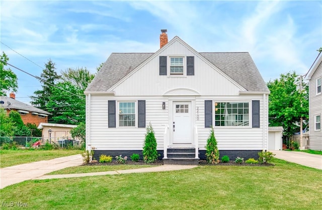 22100 Priday Ave, Euclid, OH 44123 - view of front of house featuring a chimney and roof with shingles