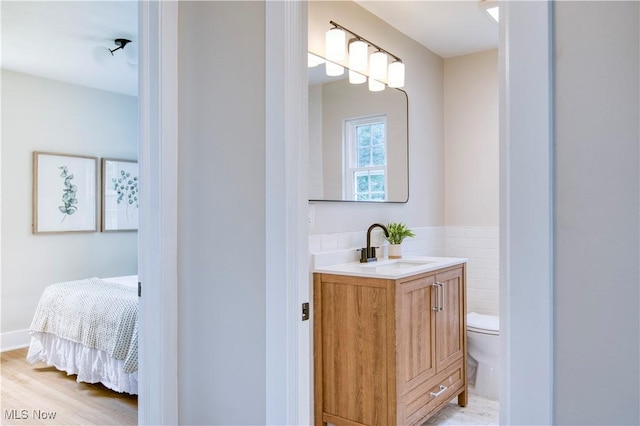 22100 Priday Ave, Euclid, OH 44123 - bathroom with vanity and wood finished floors