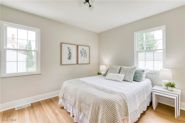 22100 Priday Ave, Euclid, OH 44123 - bedroom featuring baseboards and light wood-style floors