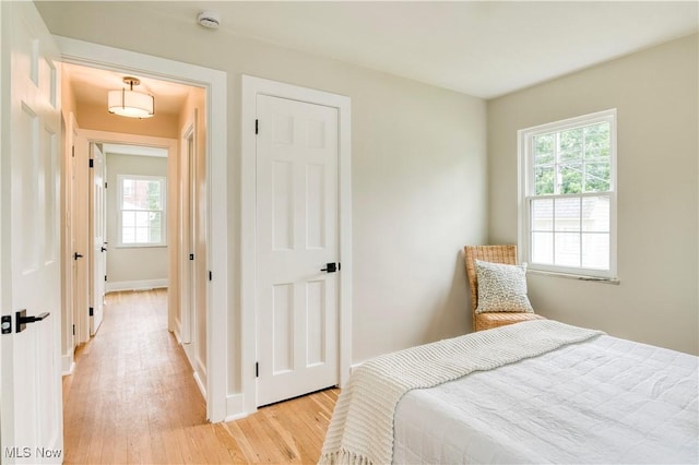 22100 Priday Ave, Euclid, OH 44123 - bedroom with multiple windows and light wood-style floors