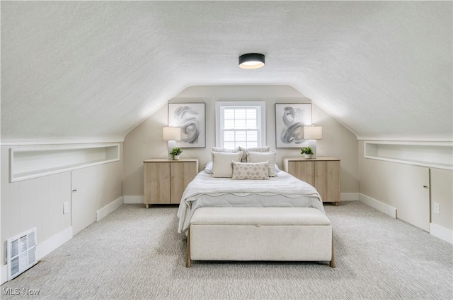 22100 Priday Ave, Euclid, OH 44123 - carpeted bedroom with a textured ceiling and lofted ceiling