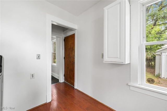 18830 Monterey Ave, Euclid, OH 44119 - hallway with dark wood finished floors