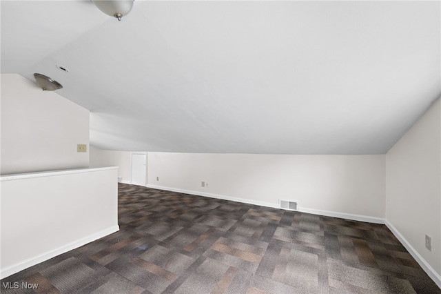 18830 Monterey Ave, Euclid, OH 44119 - additional living space with lofted ceiling and carpet