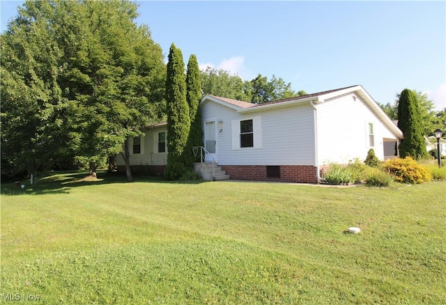 226 Troy Oaks Dr, Hiram, OH 44234 - view of front of house featuring a front yard and entry steps