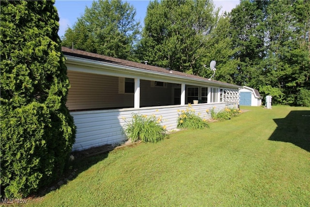 226 Troy Oaks Dr, Hiram, OH 44234 - view of green lawn with a storage unit