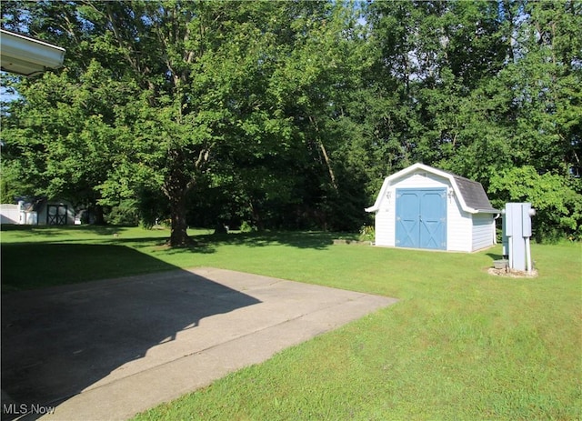 226 Troy Oaks Dr, Hiram, OH 44234 - view of grassy yard featuring a storage unit
