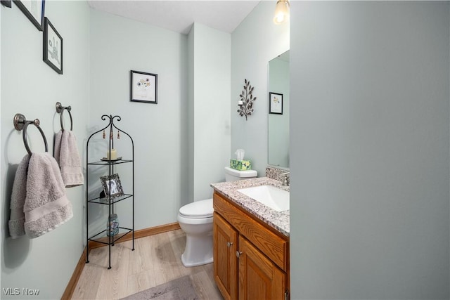 23730 Sawmill Bnd, Olmsted Falls, OH 44138 - bathroom featuring wood finished floors and vanity