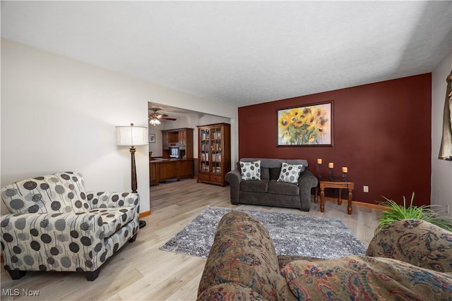 23730 Sawmill Bnd, Olmsted Falls, OH 44138 - living room with light wood finished floors and ceiling fan