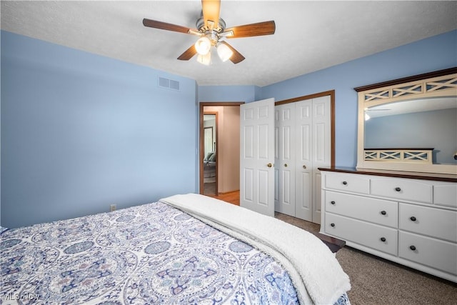 23730 Sawmill Bnd, Olmsted Falls, OH 44138 - bedroom with carpet flooring, a closet, and a ceiling fan