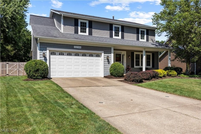 23730 Sawmill Bnd, Olmsted Falls, OH 44138 - traditional-style home with driveway, a porch, and an attached garage