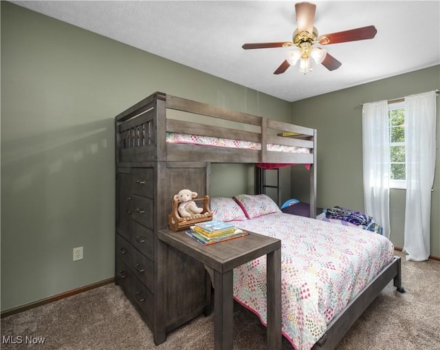 23730 Sawmill Bnd, Olmsted Falls, OH 44138 - carpeted bedroom featuring baseboards and a ceiling fan