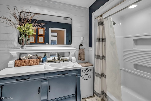 9013 Elsmere Dr, Parma, OH 44130 - bathroom with vanity and shower / bath combination with curtain