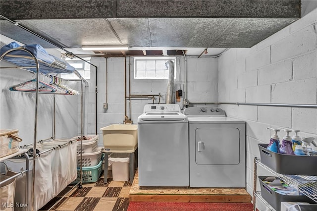 9013 Elsmere Dr, Parma, OH 44130 - washroom featuring washing machine and dryer and tile patterned floors