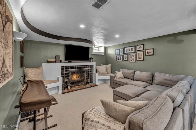 9013 Elsmere Dr, Parma, OH 44130 - carpeted living room featuring recessed lighting and a tile fireplace