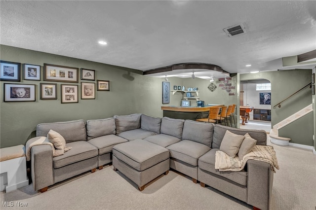 9013 Elsmere Dr, Parma, OH 44130 - living area with a textured ceiling, carpet flooring, and recessed lighting