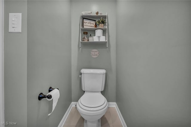 9013 Elsmere Dr, Parma, OH 44130 - bathroom featuring toilet and tile patterned flooring