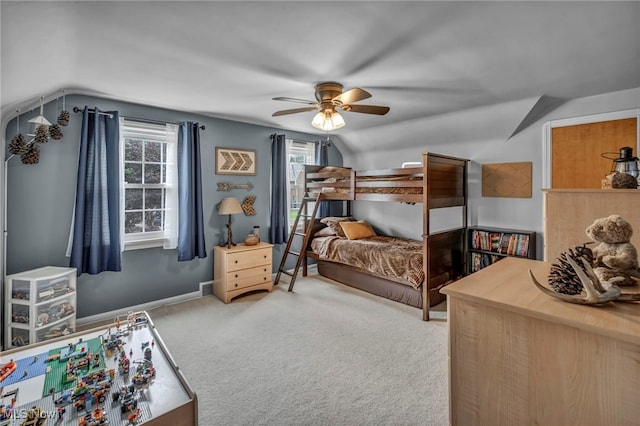 9013 Elsmere Dr, Parma, OH 44130 - carpeted bedroom with lofted ceiling and ceiling fan