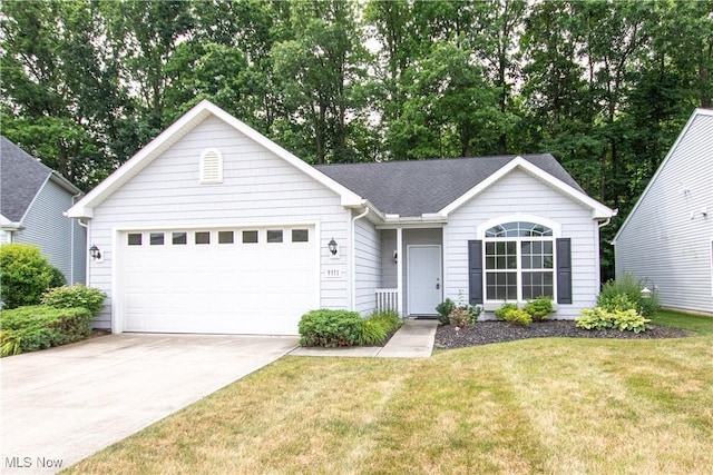 9111 Devonshire Dr, Olmsted Falls, OH 44138 - ranch-style house featuring a garage, driveway, and a front yard