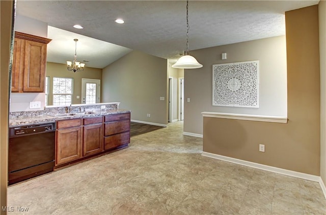 9111 Devonshire Dr, Olmsted Falls, OH 44138 - kitchen with black dishwasher, brown cabinets, decorative light fixtures, and recessed lighting