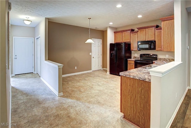 9111 Devonshire Dr, Olmsted Falls, OH 44138 - kitchen featuring black appliances, a textured ceiling, recessed lighting, hanging light fixtures, and a peninsula
