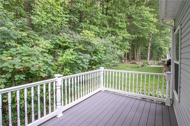 9111 Devonshire Dr, Olmsted Falls, OH 44138 - deck with a yard