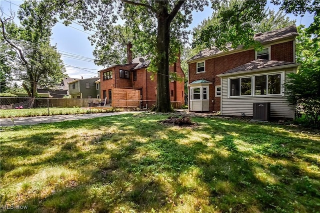 2607 Ashurst Rd, University Heights, OH 44118 - rear view of house featuring brick siding
