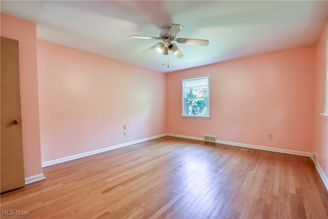 2607 Ashurst Rd, University Heights, OH 44118 - empty room featuring ceiling fan and wood finished floors