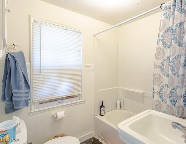 1387 Glenview Rd, Toledo, OH 43614 - bathroom with toilet and shower / bath combination with curtain