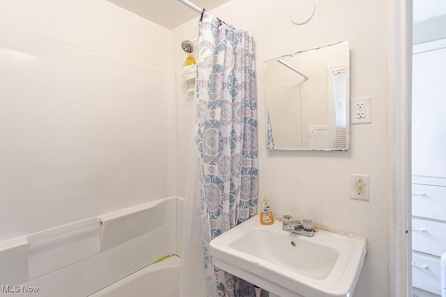 1387 Glenview Rd, Toledo, OH 43614 - bathroom with a sink and shower / bathtub combination with curtain