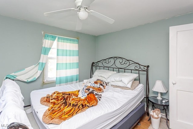 1387 Glenview Rd, Toledo, OH 43614 - bedroom featuring a ceiling fan and wood finished floors