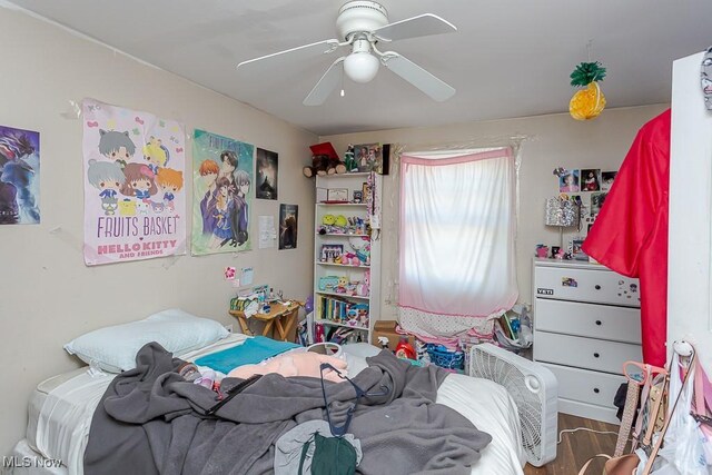 1387 Glenview Rd, Toledo, OH 43614 - bedroom featuring a ceiling fan and wood finished floors