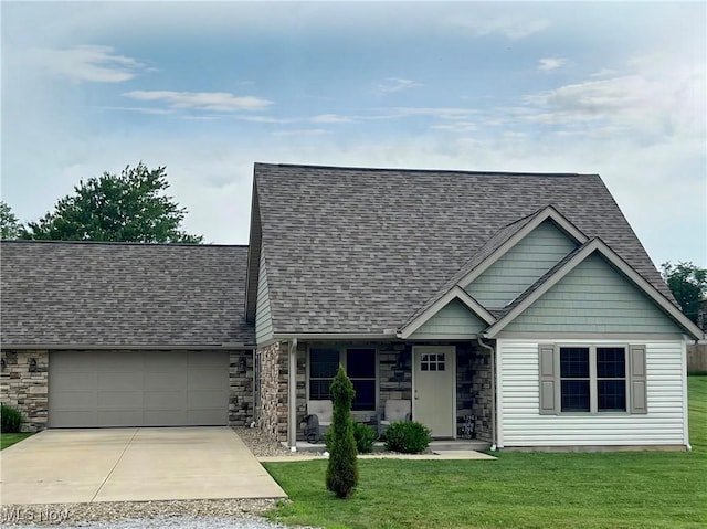 507B Memory Ln, Bethesda, OH 43719 - view of front of property with concrete driveway, a garage, a shingled roof, a front yard, and stone siding