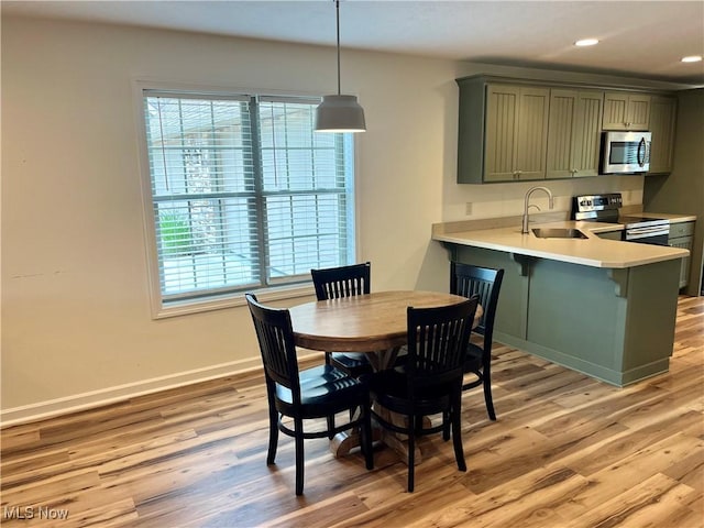 507B Memory Ln, Bethesda, OH 43719 - dining room with light wood-style flooring and recessed lighting
