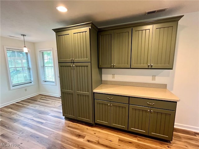 507B Memory Ln, Bethesda, OH 43719 - kitchen with light wood-type flooring, light countertops, recessed lighting, and pendant lighting