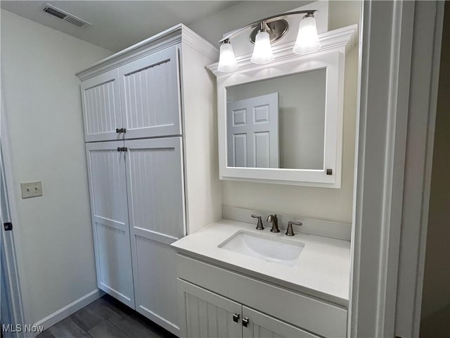 507B Memory Ln, Bethesda, OH 43719 - bathroom featuring vanity and wood finished floors
