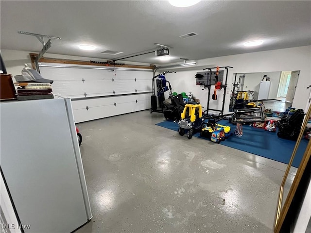 507B Memory Ln, Bethesda, OH 43719 - garage featuring a garage door opener