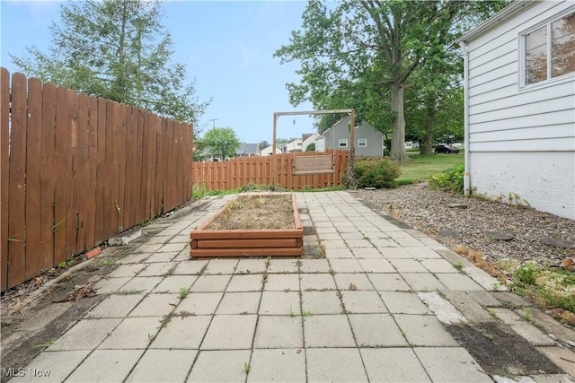 1005 Fairview Blvd, Coshocton, OH 43812 - view of patio featuring a vegetable garden